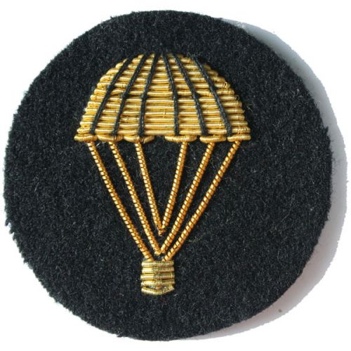 Parachute Gold On Black Badge